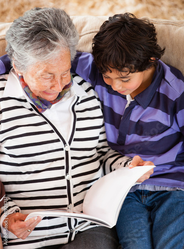 Photo: Grandmother reading a story Grandmother reading a story