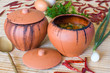 Meat baked with vegetables in rustic clay pot Meat baked with vegetables in rustic clay pot