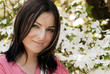 Young pretty woman with flowers