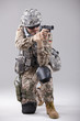 Photo: Soldier aiming with gun Soldier aiming with gun