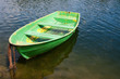 Old wooden boat on lake Old wooden boat on lake