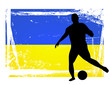 soccer player in front of the ukraine flag