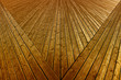 Wooden planks that make up a large pier.