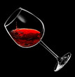 drops of red wine dripping into a glass drops of red wine dripping into a glass