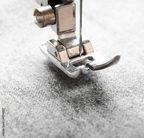 Photo: The sewing machine and fabric. The sewing machine and fabric.