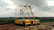 Building cranes on a construction site