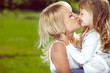 Foto: Mother holds her daughter in her arms Mother holds her daughter in her arms