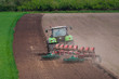 farmer ploughing field