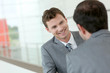 Photo: Business meeting in building hallway Business meeting in building hallway