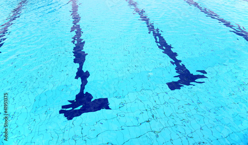 Photo: Turquoise, blue clear water in a swimming pool Turquoise, blue clear water in a swimming pool