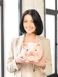 lovely woman with piggy bank lovely woman with piggy bank