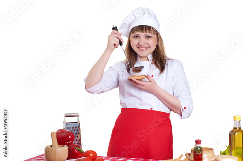 Photo: attractive woman cooking attractive woman cooking