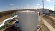 Oil refinery. A huge oil tanker (fisheye) Oil refinery. A huge oil tanker (fisheye)