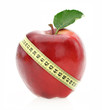 Diet concept. Apple with measuring tape