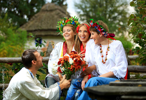 Photo: Young people in Ukrainian clothes flirting Young people in Ukrainian clothes flirting