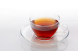 Transparent cup with green tea
