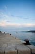 Some bollards and a sailing ship, Dugi otok Croatia