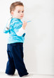 Boy drawing on the wall