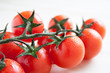 cherry tomatoes on branch