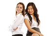 Photo: Asian and Caucasian business women Asian and Caucasian business women