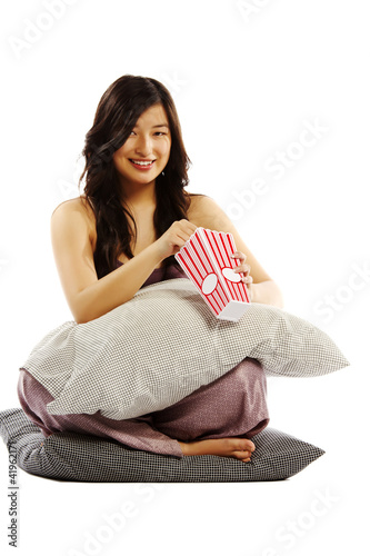Photo: Young asian woman holding pillow Young asian woman holding pillow