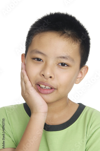 Photo: A little cute kid is thinking A little cute kid is thinking