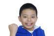 cheerful smiling little boy raised his hands up.