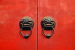 Lion chines door hand grip on red door, chines style