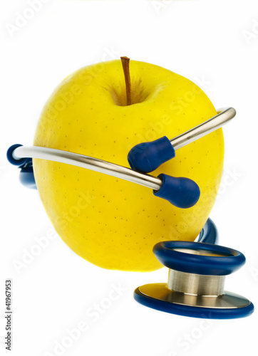 Foto: Stethoskop und Apfel. Gesunde Ernährung Stethoskop und Apfel. Gesunde Ernährung