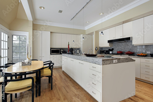 Photo: Kitchen with white cabinetry Kitchen with white cabinetry