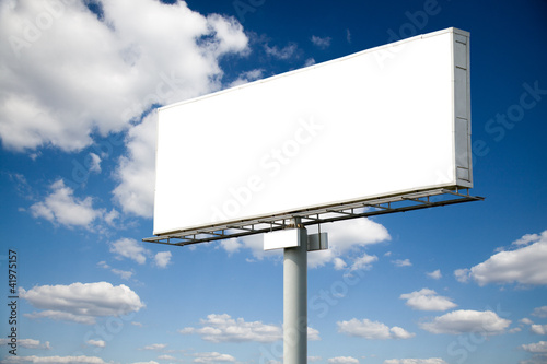 Photo: Blank billboard on blue sky Blank billboard on blue sky