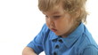 boy playing in white room