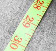 Measuring roulette on fabric.