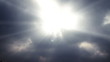 time lapse of the clouds billowing and moving with god rays