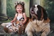 Adorable Child and Her Saint Bernard Puppy Dog