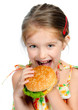 little girl eating a sandwich isolated