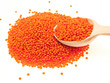 Red lentils & spoon.