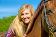 Junge Frau beim Reiten