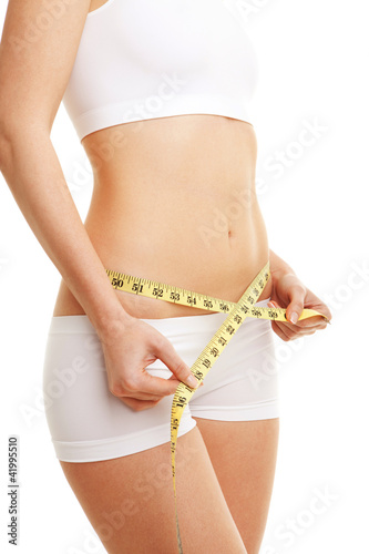 Foto: woman with measure tape woman with measure tape