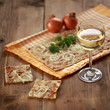 Flammkuchen mit Speck und Zwiebeln