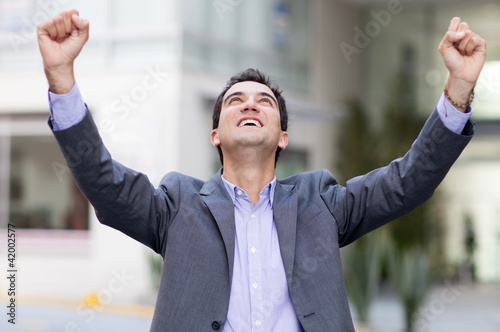 Foto: Business man celebrating Business man celebrating