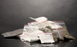 Cocaine and marihuana in packages on grey background