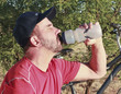 A Bicyclist Stops for a Water Break
