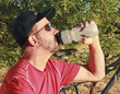 A Bicyclist Stops for a Water Break