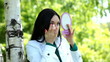 Pretty woman applying make up