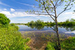 Idyllic scenery of sky reflected in the river Idyllic scenery of sky reflected in the river