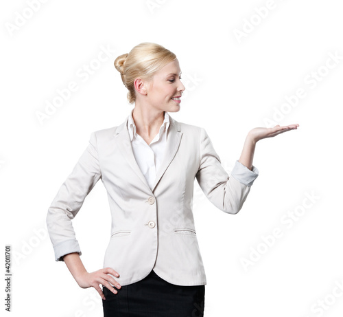 Photo: Attractive business woman offers something Attractive business woman offers something