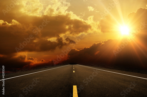 Photo: Road ahead and the sunset Road ahead and the sunset
