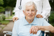 Happy senior lady in wheelchair