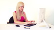 Vídeo: young blonde woman working and talking by mobile phone, over whi young blonde woman working and talking by mobile phone, over whi
